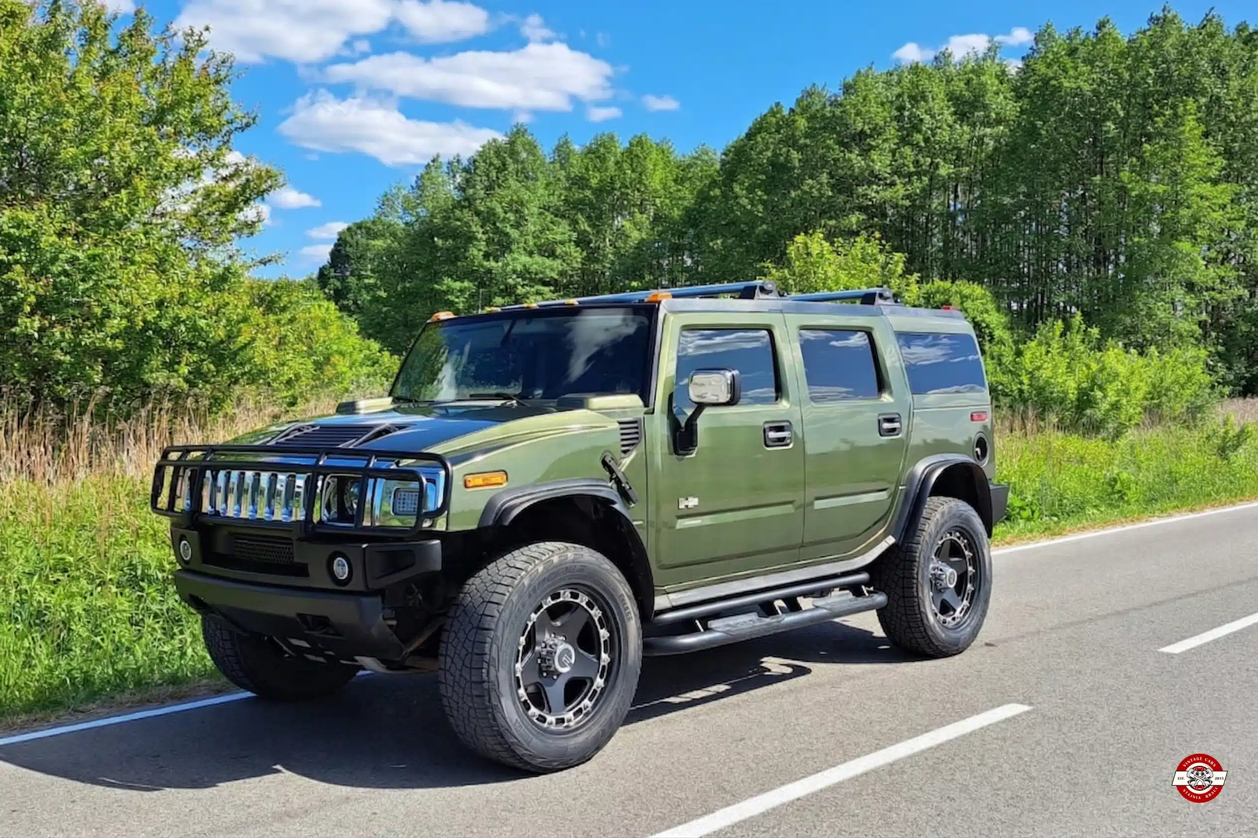 Hummer H2 2003 ciemnozielony wynajem do slubu Warszawa